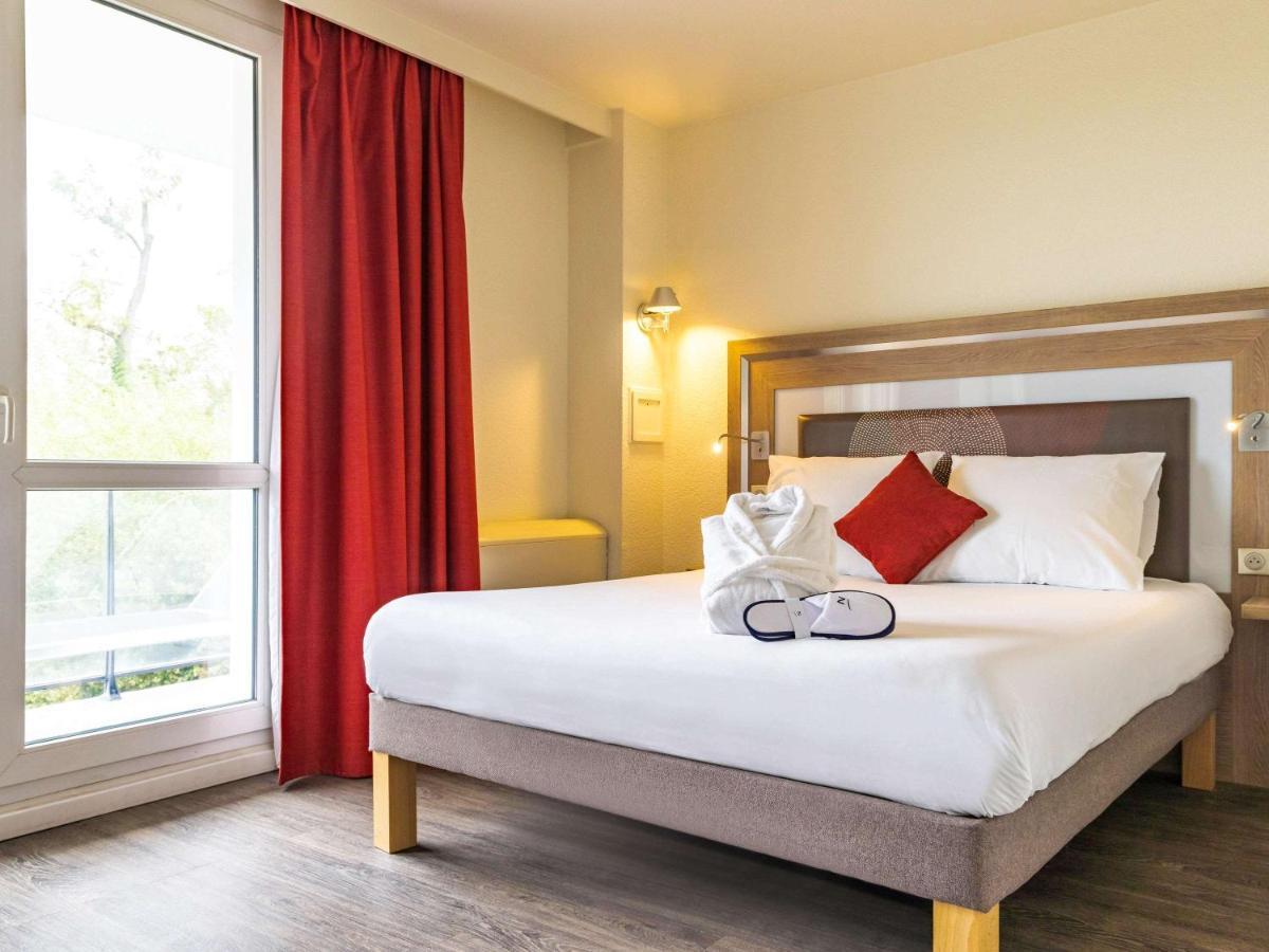 Novotel Senart Golf De Greenparc Saint-Pierre-du-Perray Buitenkant foto