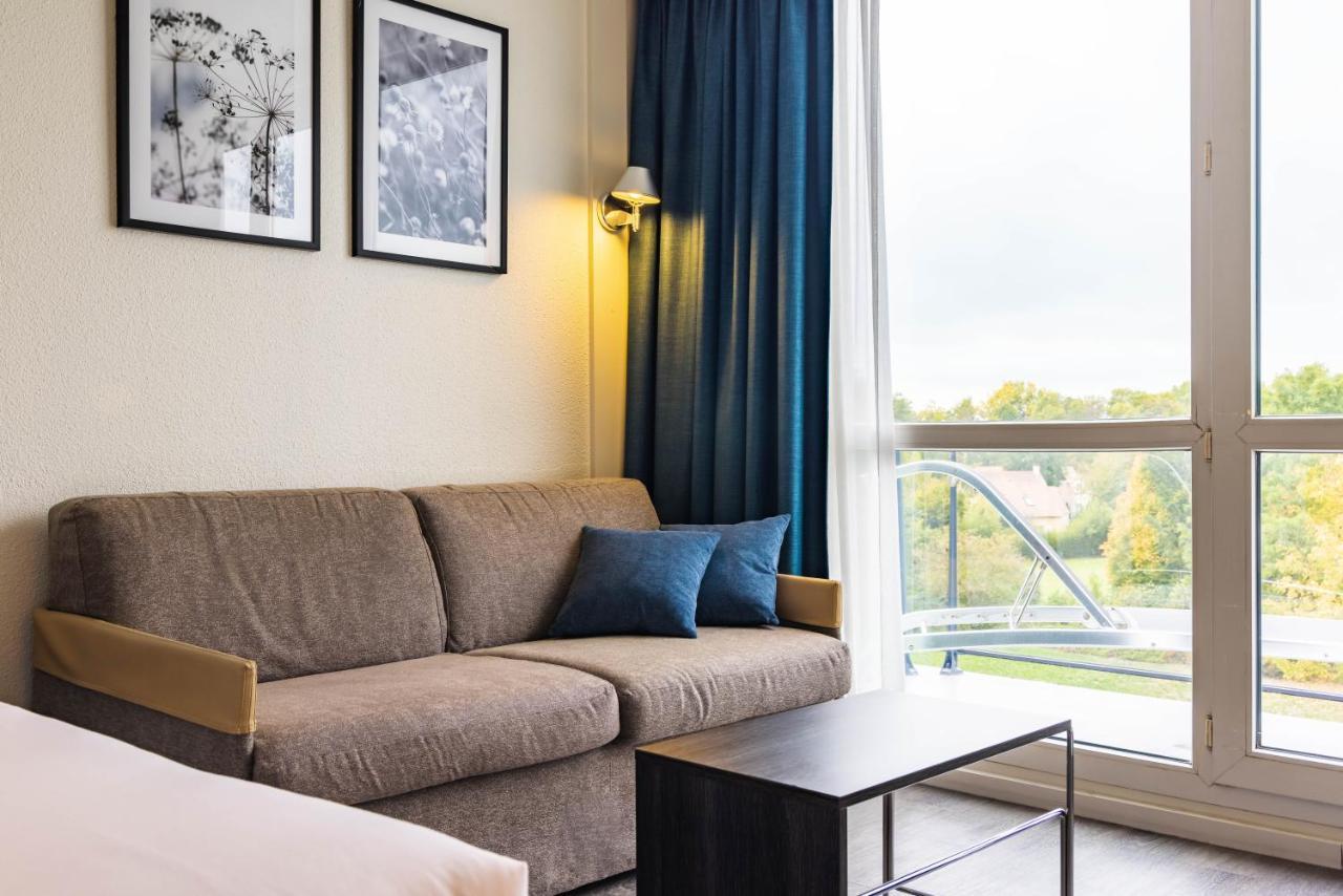 Novotel Senart Golf De Greenparc Saint-Pierre-du-Perray Buitenkant foto