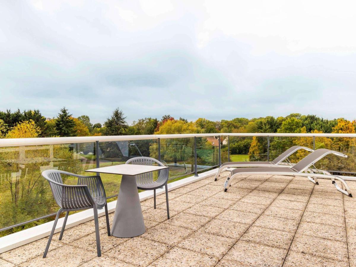 Novotel Senart Golf De Greenparc Saint-Pierre-du-Perray Buitenkant foto